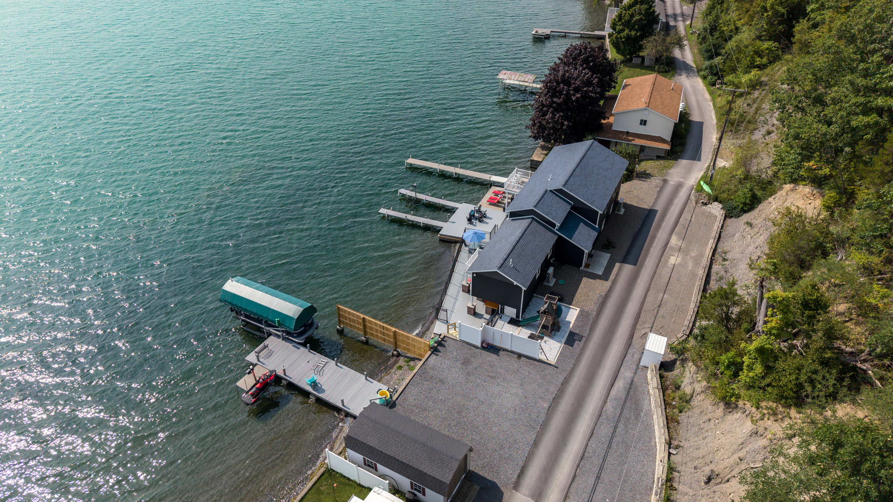 Aerial view of the property and waterfront