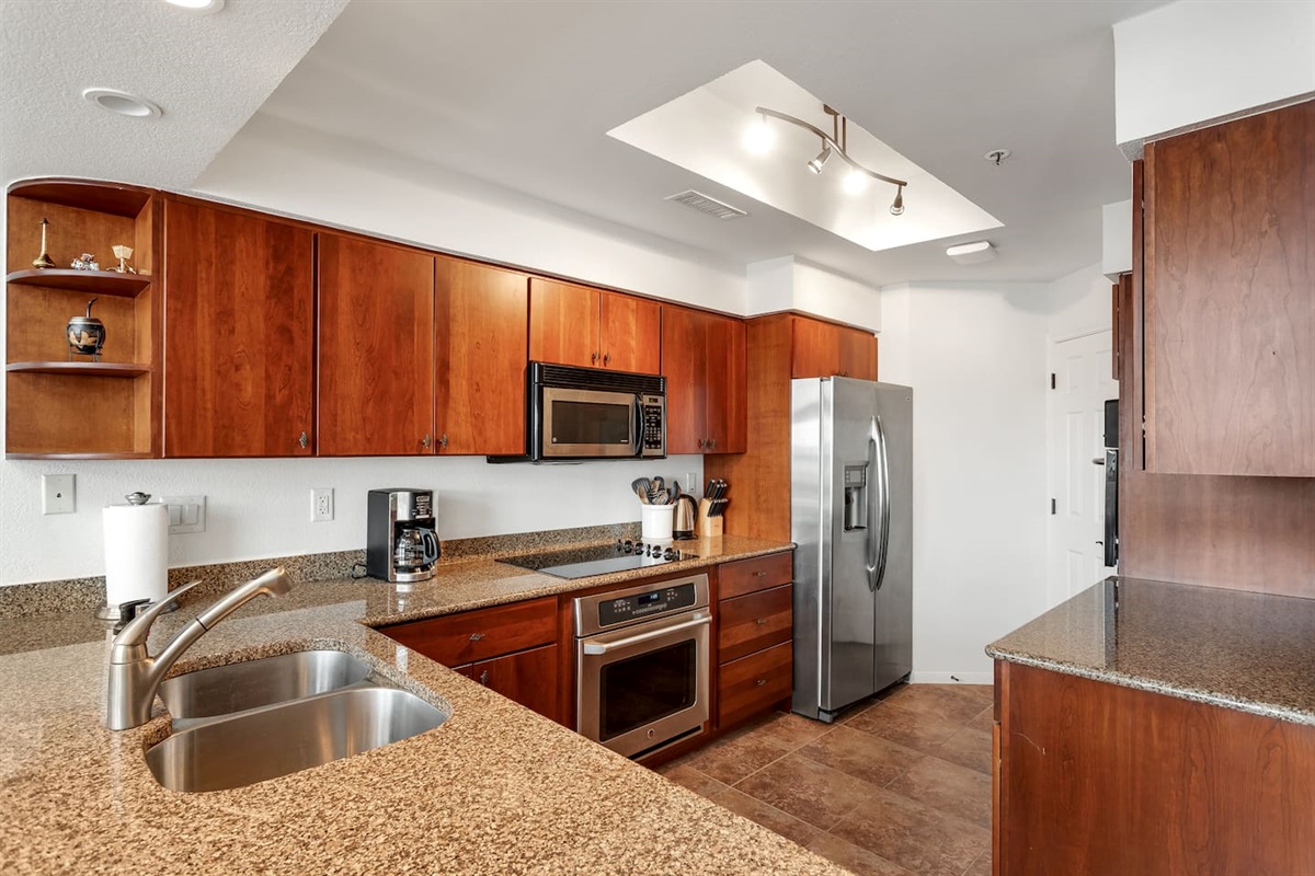 Spacious Fully Equipped Kitchen with Granite Counters