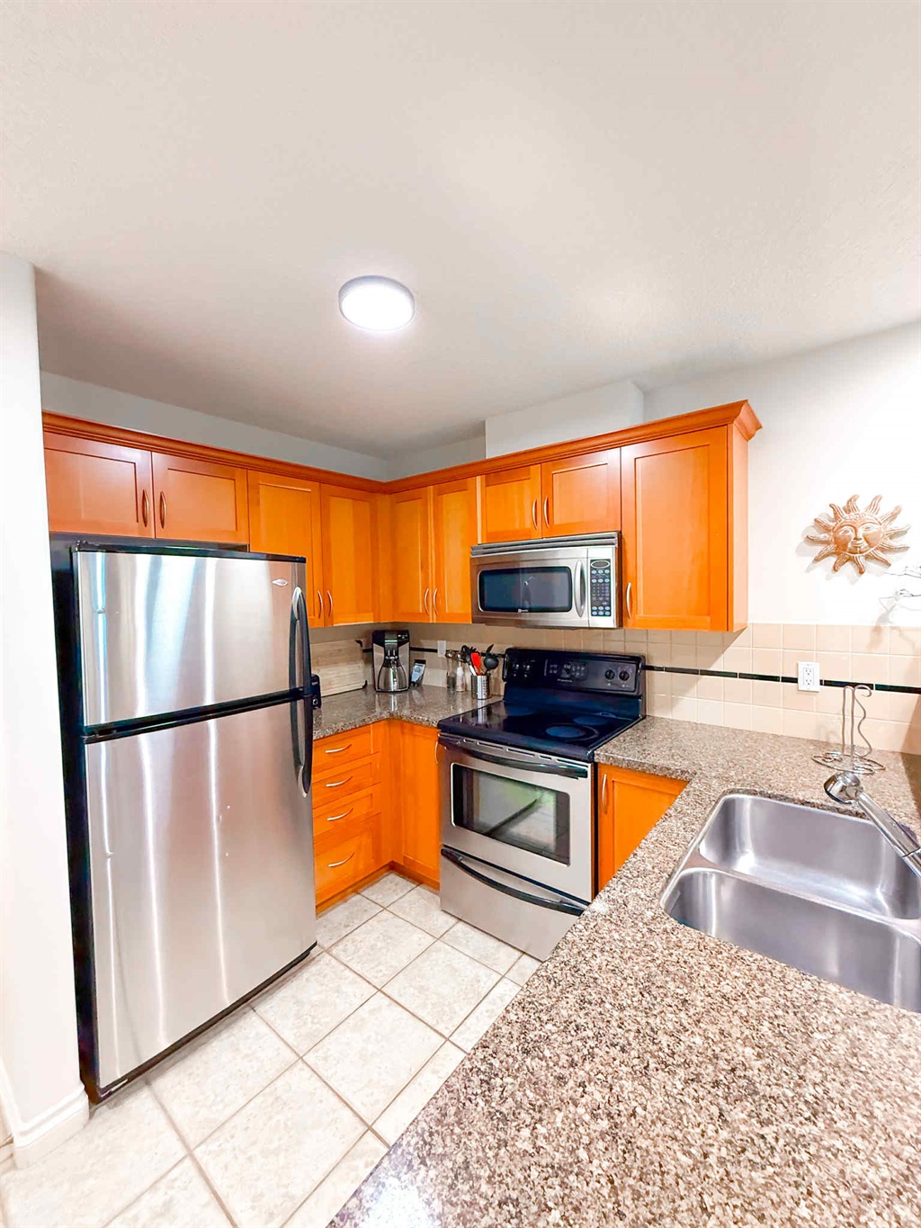 Unit A - So much counterspace! Fridge, Stove, microwave and dishwasher.