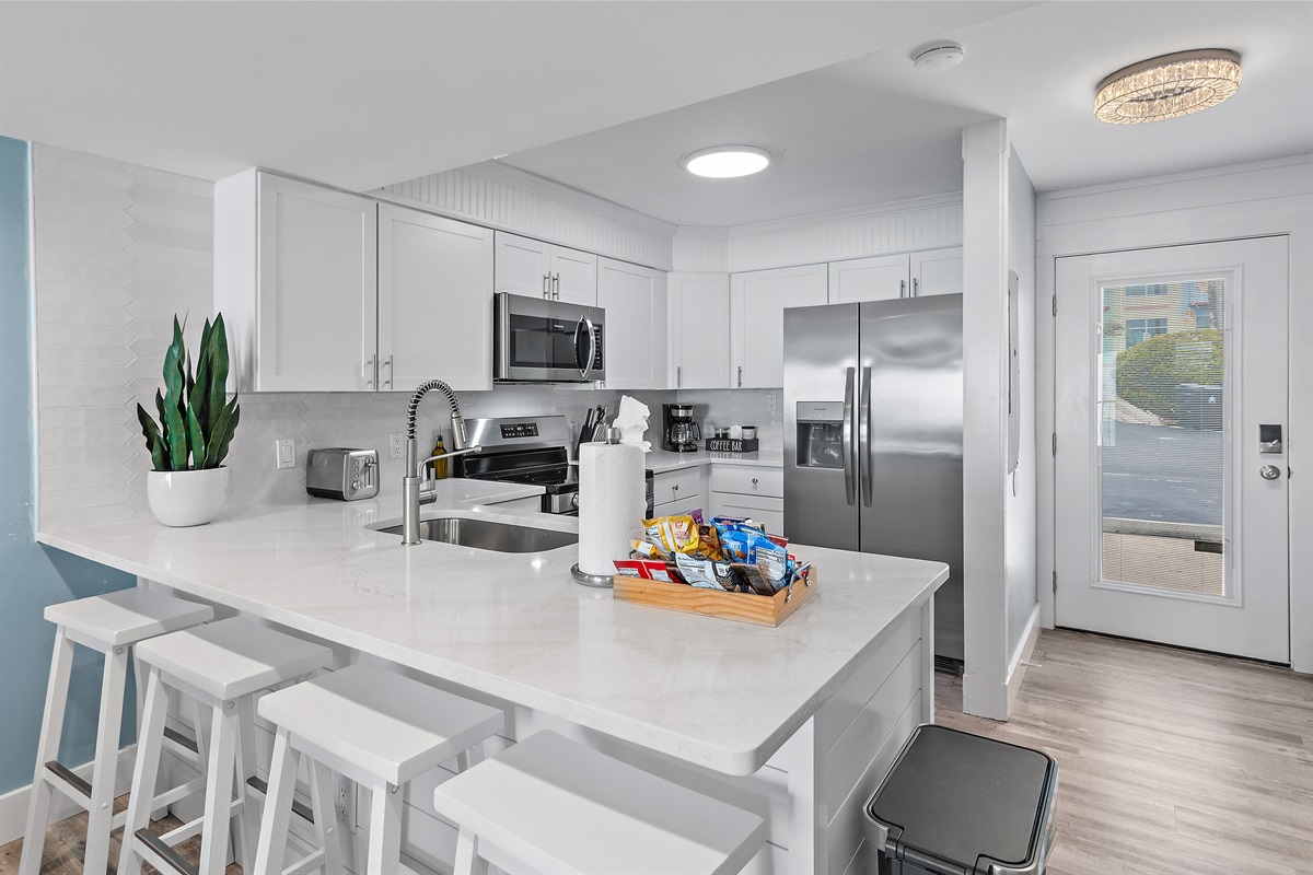 Cook delicious meals in the REMODELED Kitchen while overlooking the Gulf of Mexico