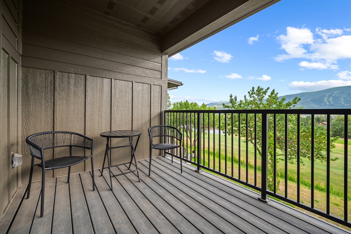 Enjoy fresh air and peaceful surroundings with a bistro set, perfect for sipping wine or dining al fresco.