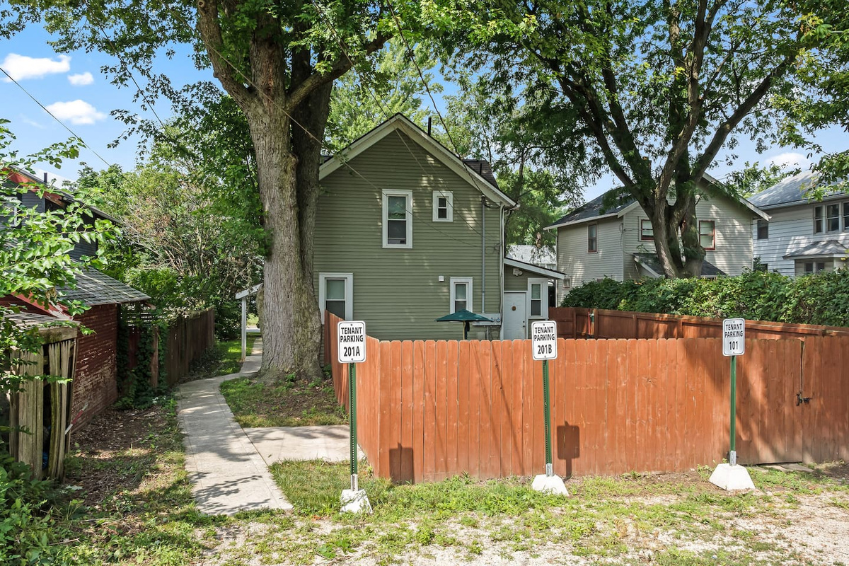 Shaded and quiet, the side yard is a peaceful spot to relax outside.