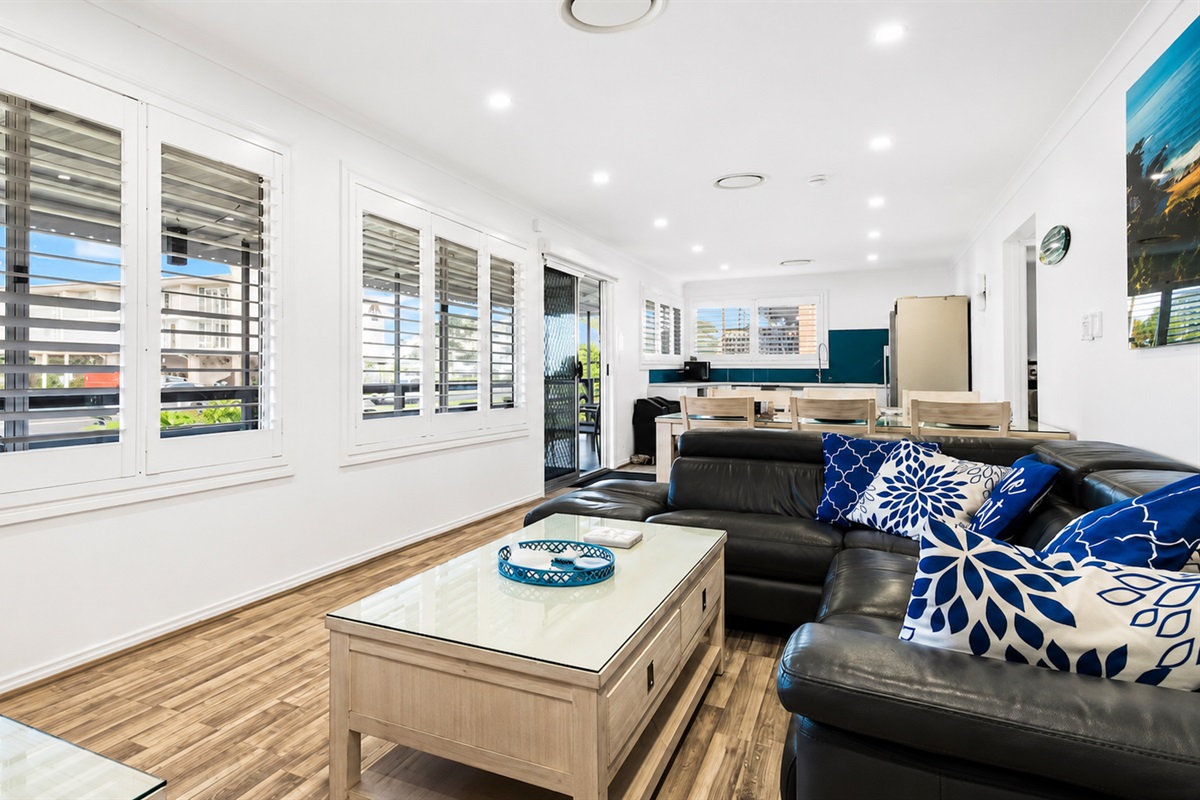 Skye&rsquo;s Beach House Malua Bay features an upstairs living, dining and kitchen area, with water views from the kitchen windows.