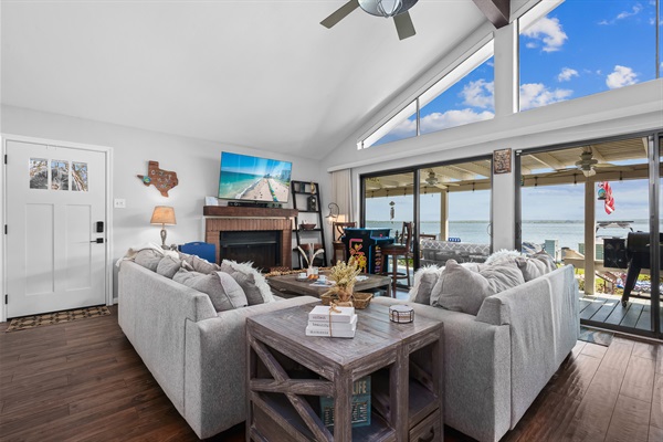 Cozy up by the fireplace or gather for movie night—all with a front-row seat to the lake right outside your window.