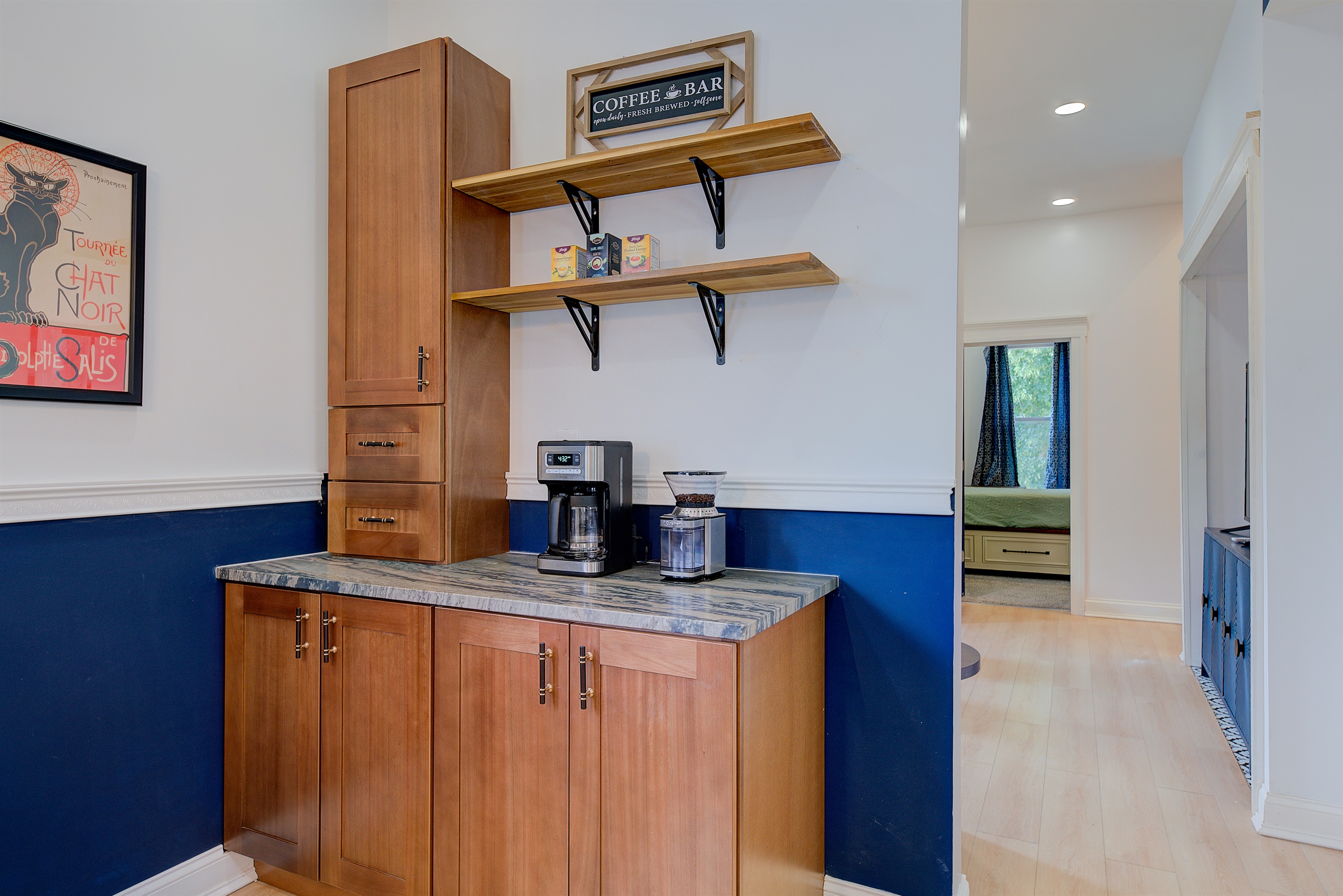 Coffee bar, stocked with coffee, tea, cream, sugar, french press