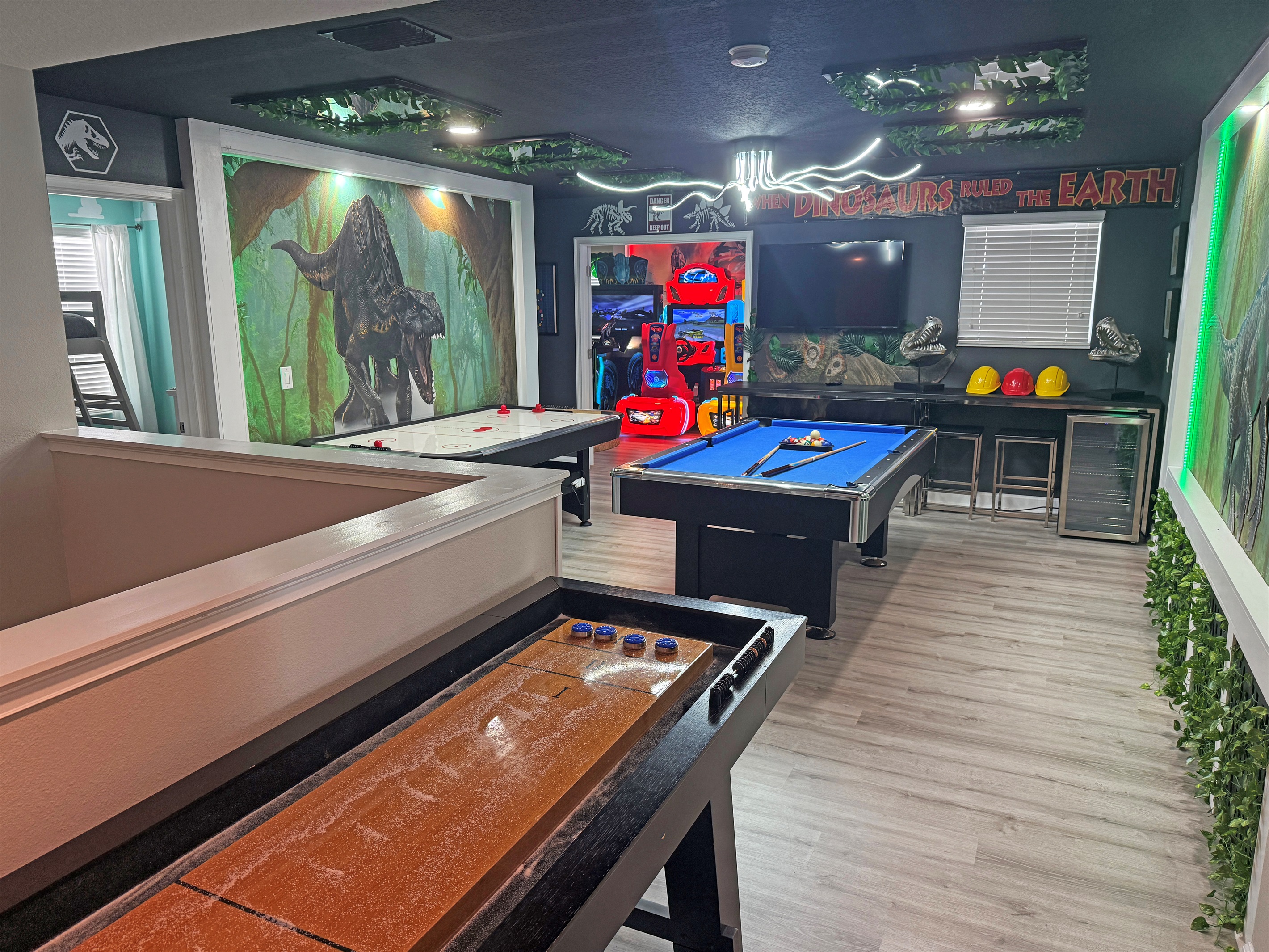 Play Shuffleboard, Pool And Air Hockey