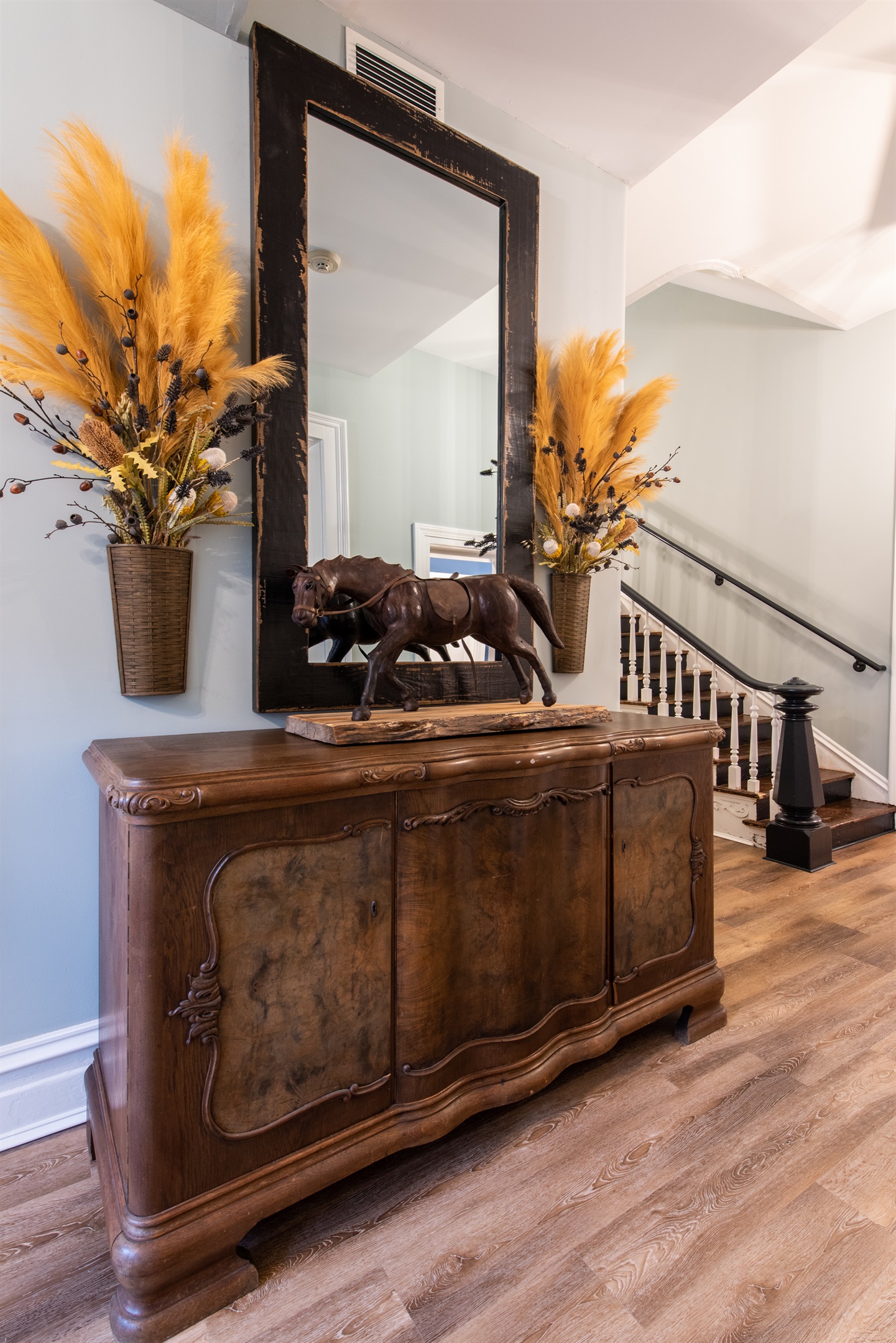Front Entry, staircase to upper levels and elevator for guest use only