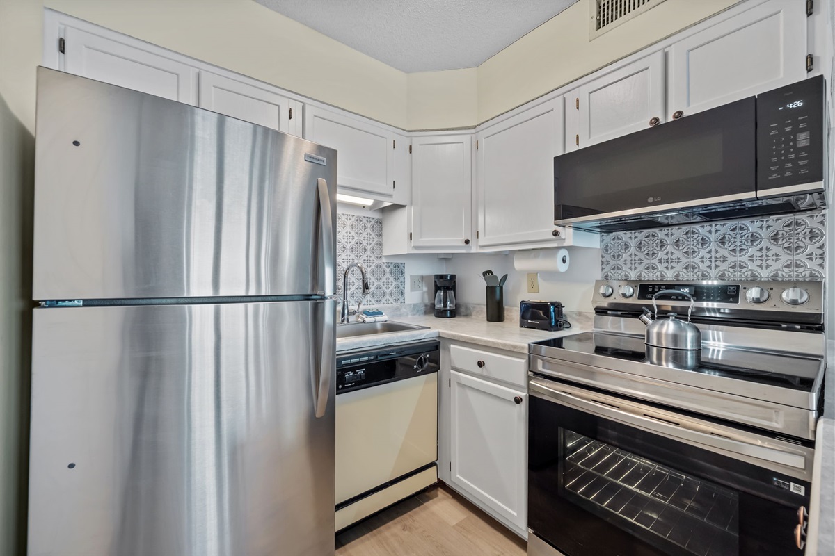Compact, efficient kitchen with full-size appliances and everything you need to prep meals with ease