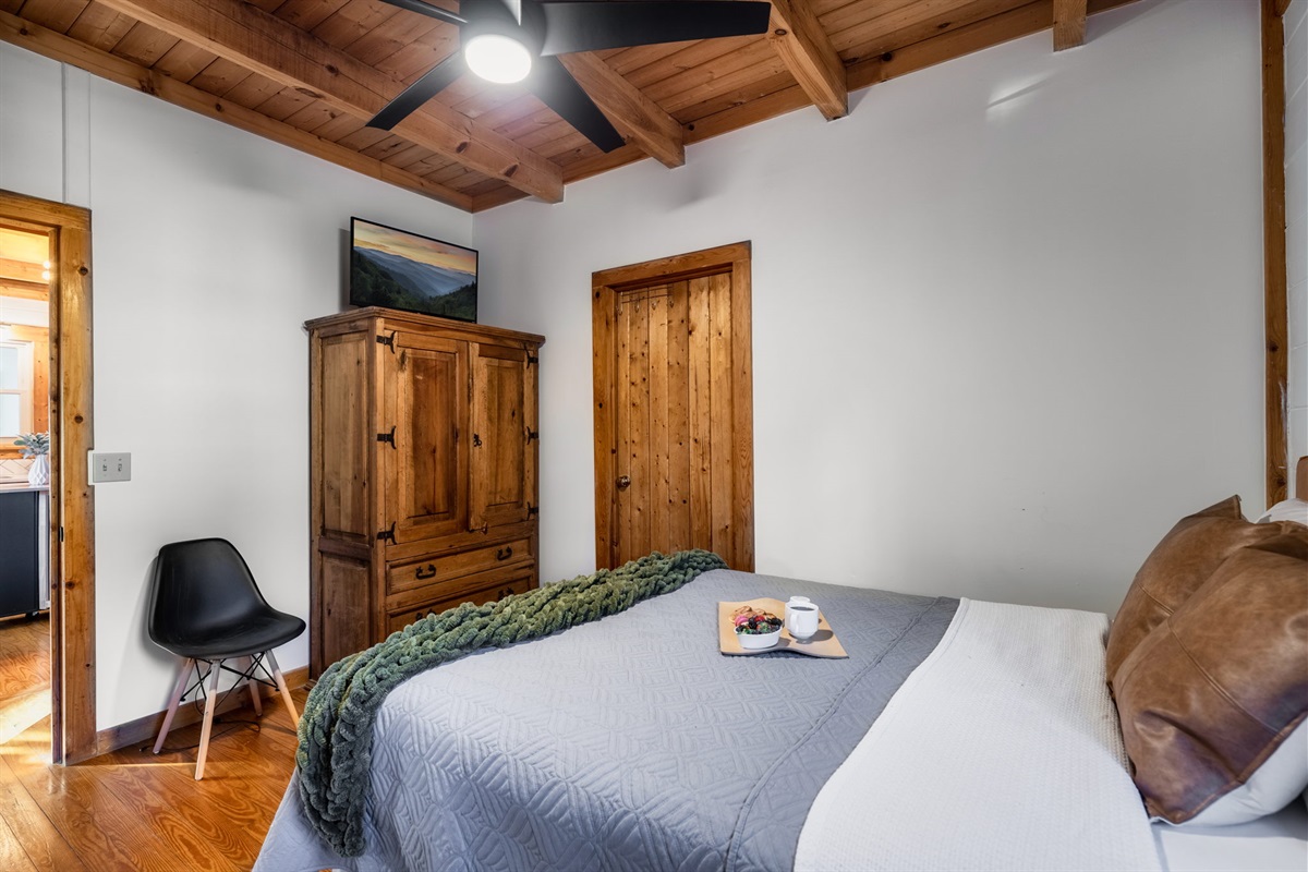 Step into comfort and coziness with our inviting bedroom sanctuary.