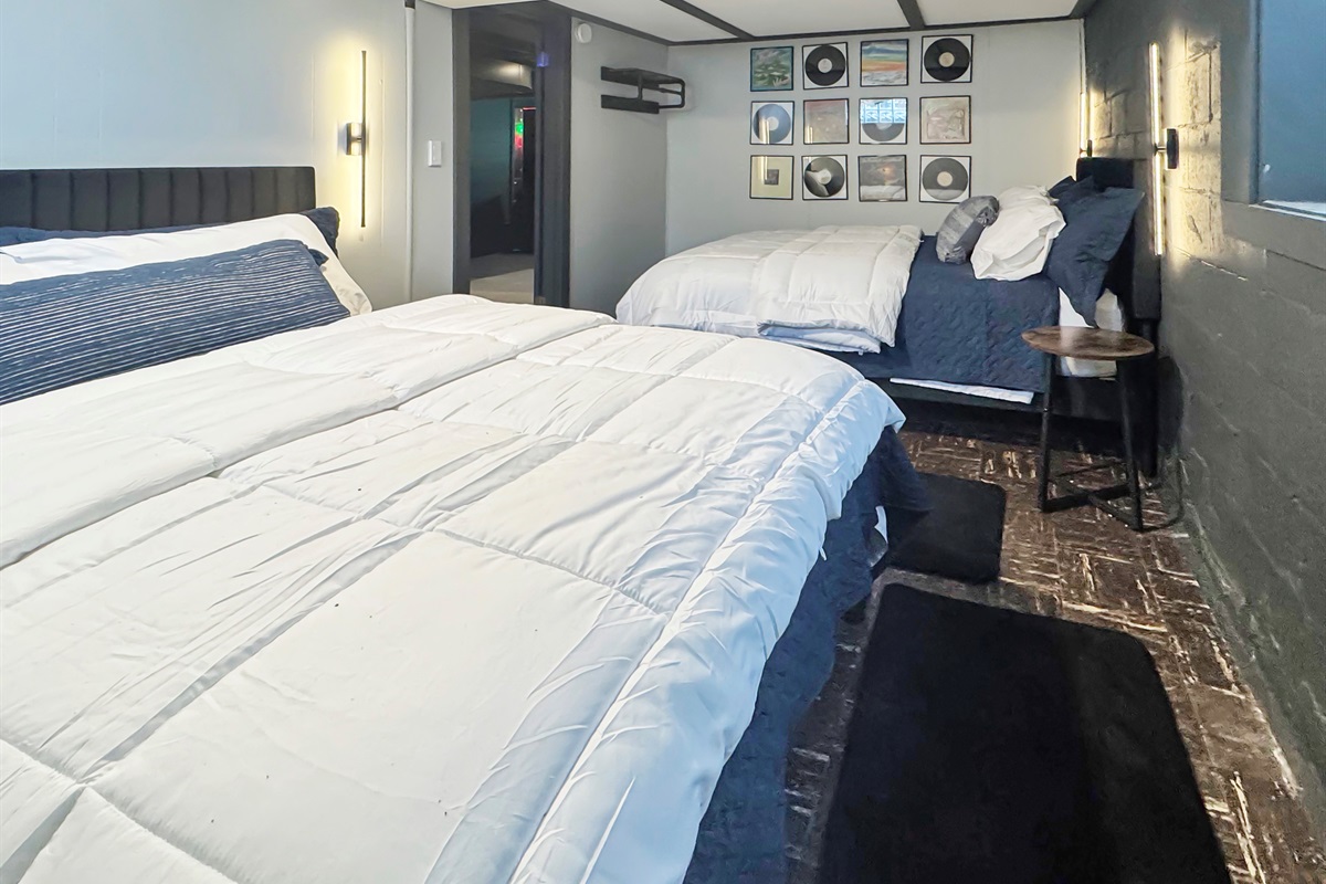 Lower level suite with two queen beds - perfect for kids or extra guests.