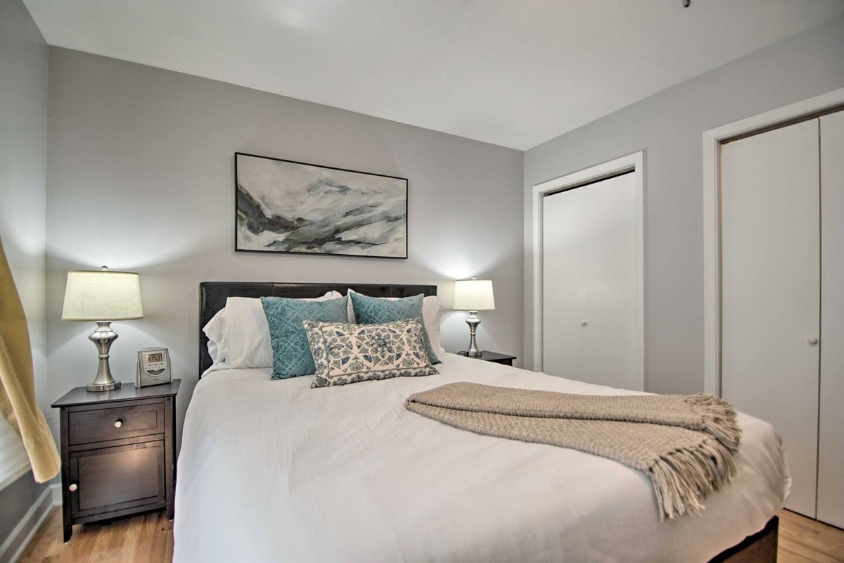 The private first floor master bedroom has a queen size bed, window AC, and ceiling fan (not shown) for your sleeping comfort.