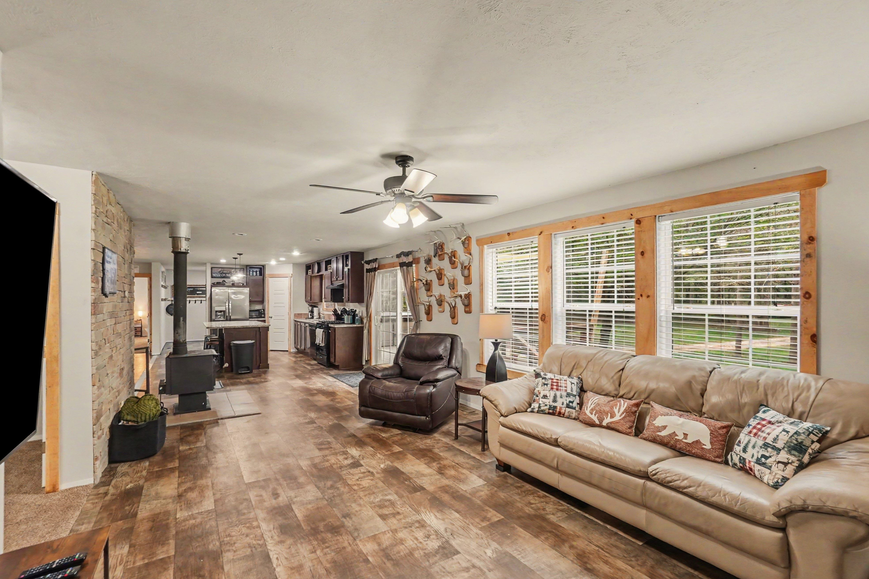 Living room with recliner and smart tv.