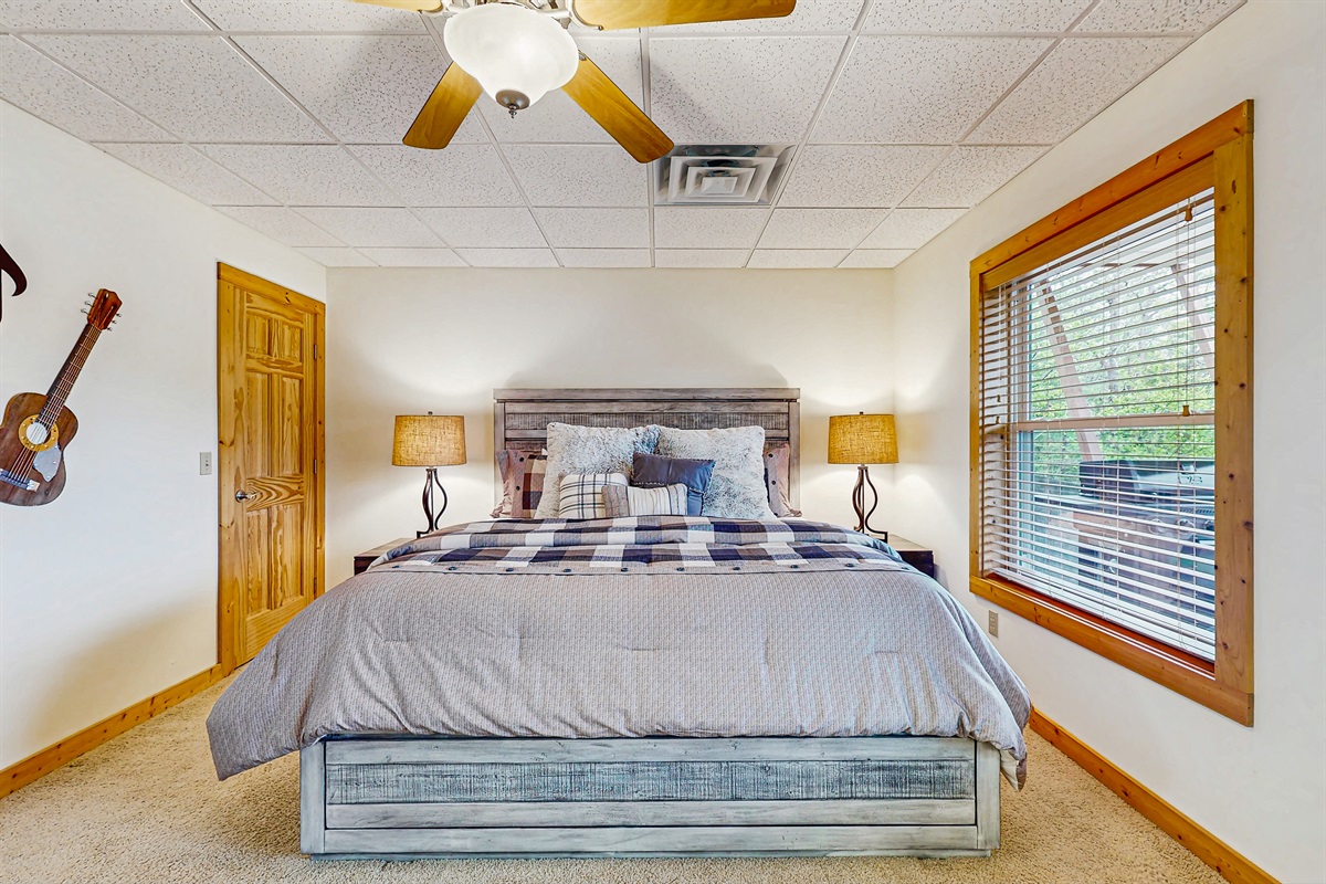 Spacious lower king bedroom w/ en-suite bathroom