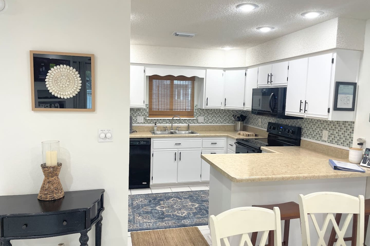 Cook a proper meal without bumping elbows &mdash; the kitchen has everything you need, including stainless appliances and a full spice rack already stocked.
