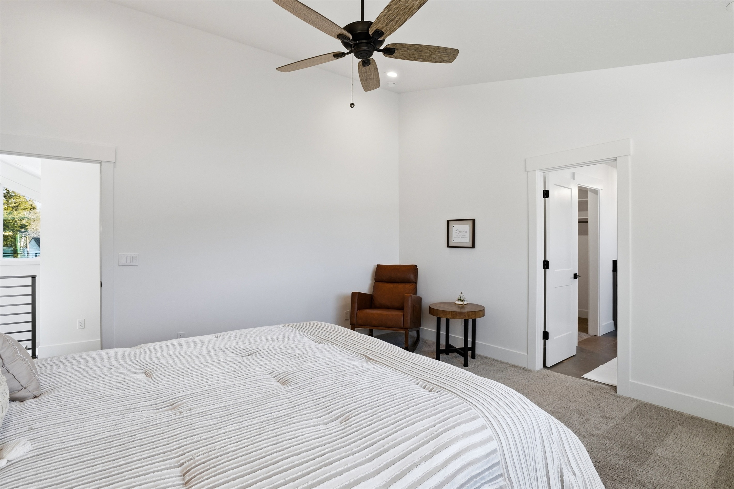 Bright and Airy Bedroom Featuring a Private Reading Nook