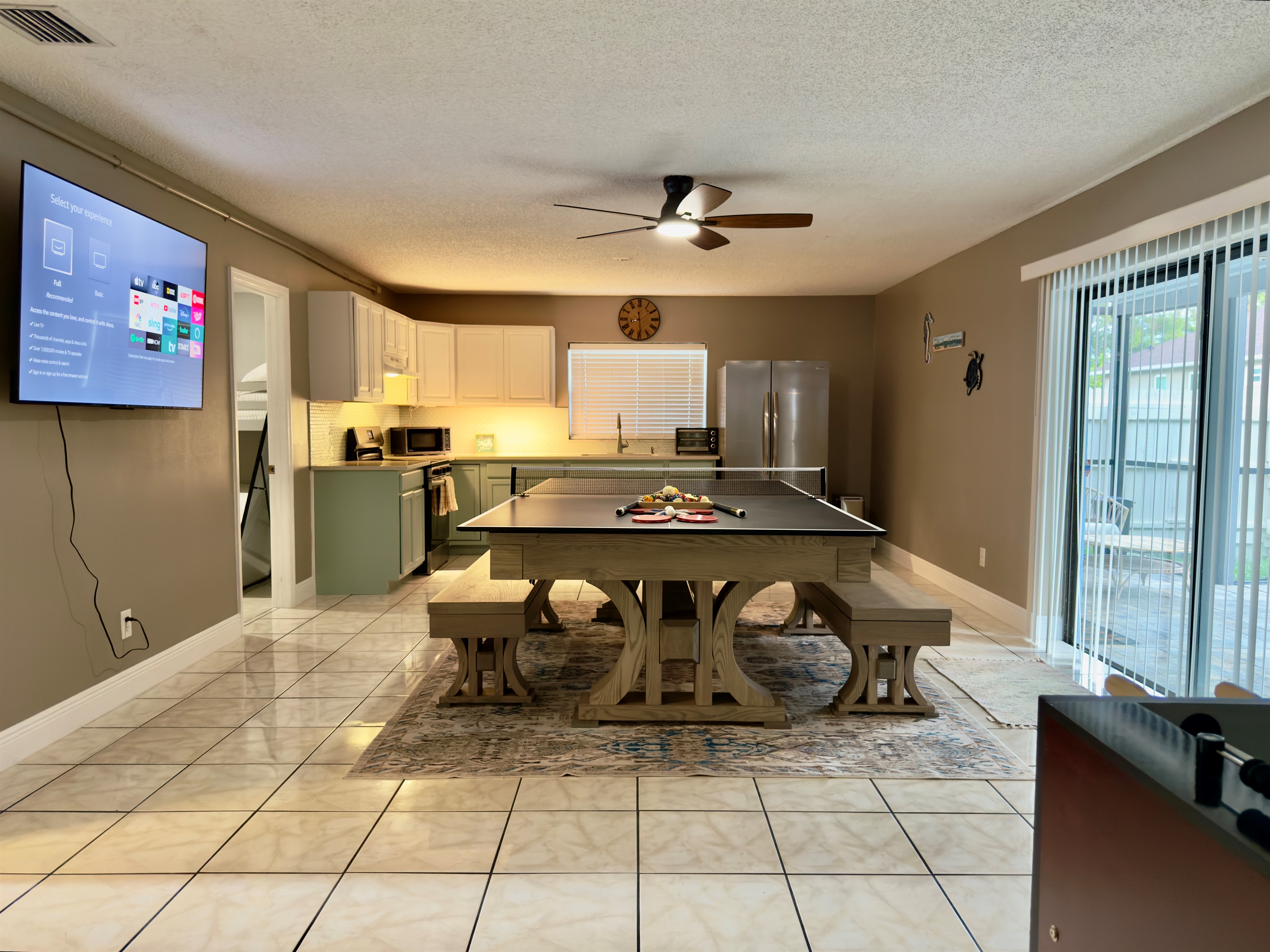 Kick back and binge your favorite shows or watch the big game while others play nearby.