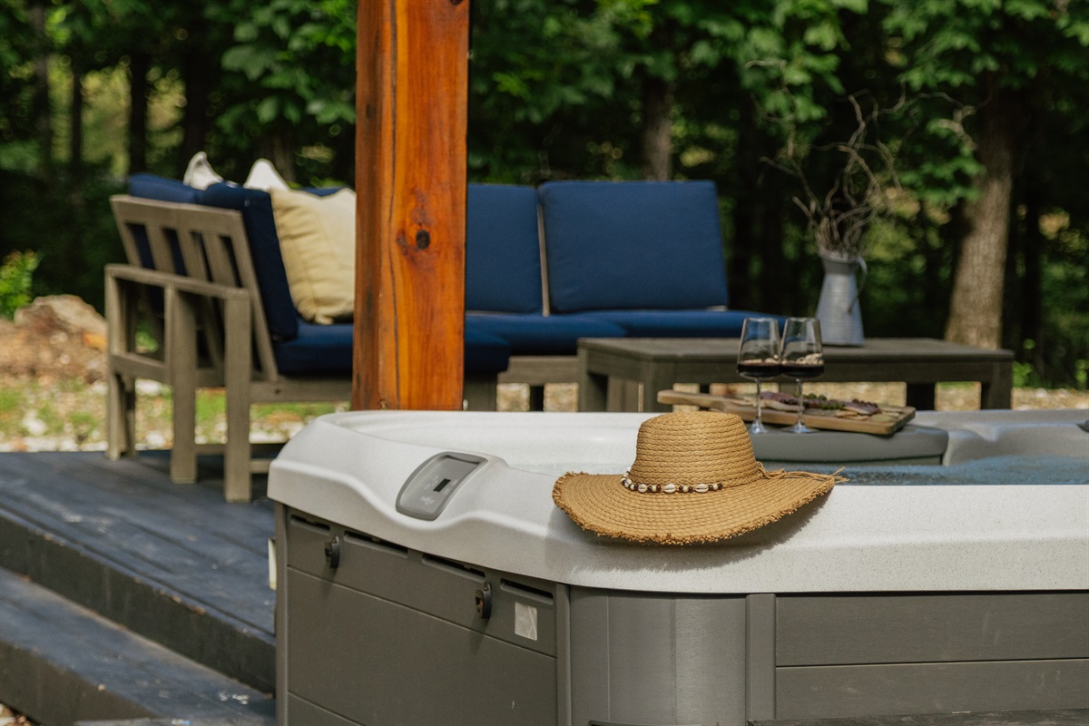 Unwind in the Hot Tub while surrounded by towering pines.