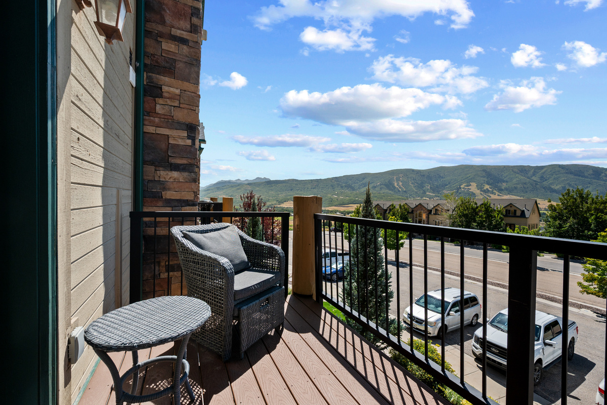 A peaceful balcony retreat makes it easy to slow down and enjoy the beautiful setting.