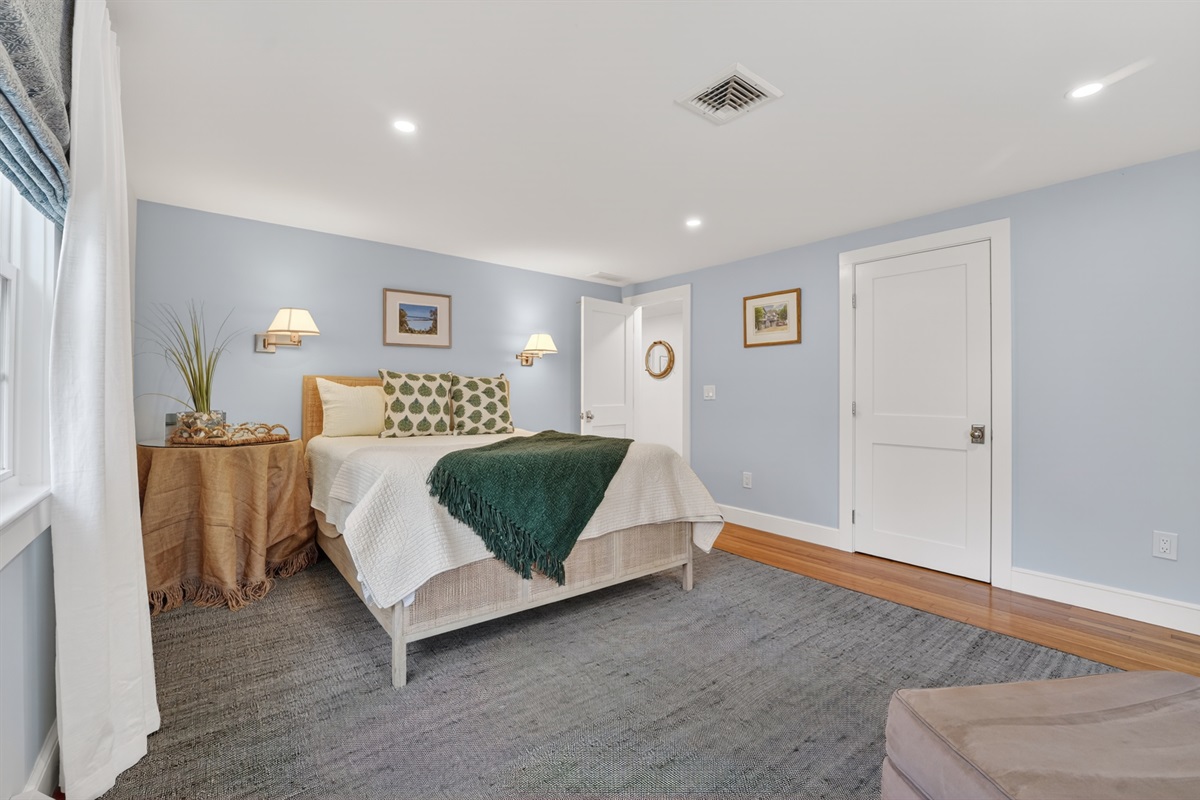 Relax in a gentle, homey third bedroom with a queen bed!