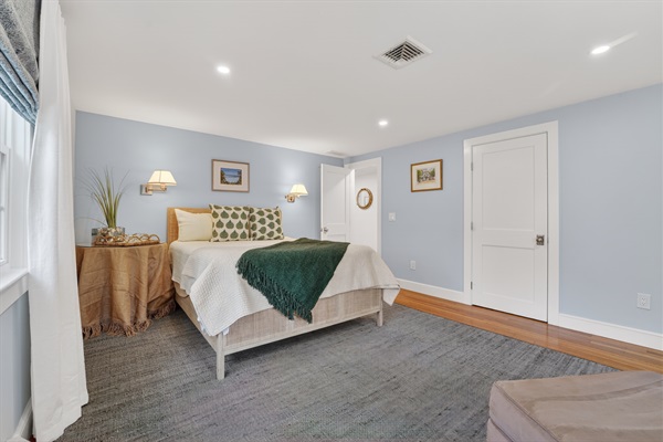 Relax in a gentle, homey third bedroom with a queen bed!