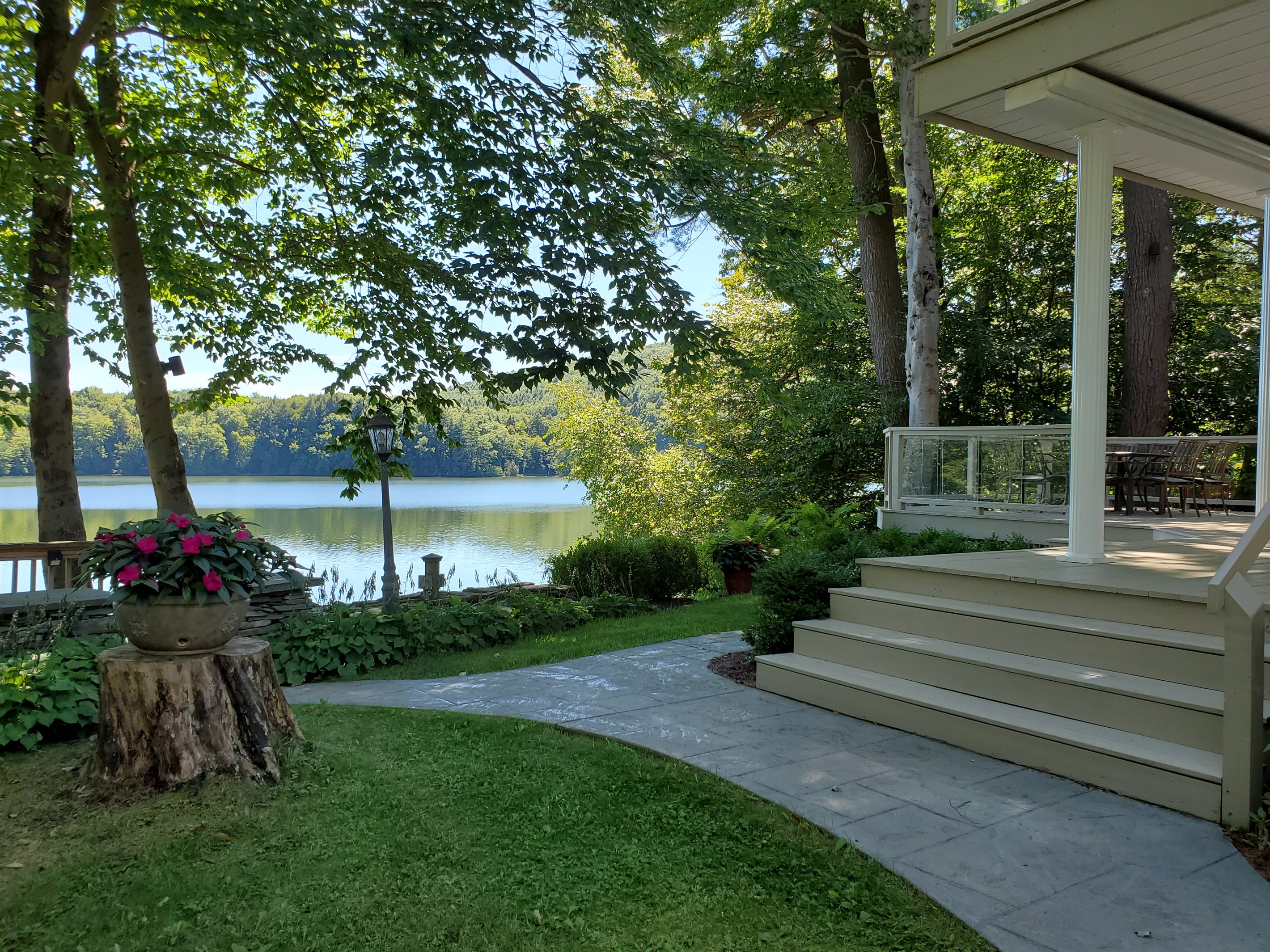 Stamped concrete walkway to lake and front deck