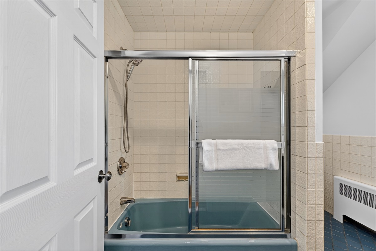Full spacious bathroom designed for comfort and convenience with ample space and essential amenities.