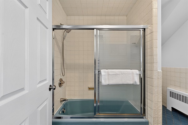 Full spacious bathroom designed for comfort and convenience with ample space and essential amenities.