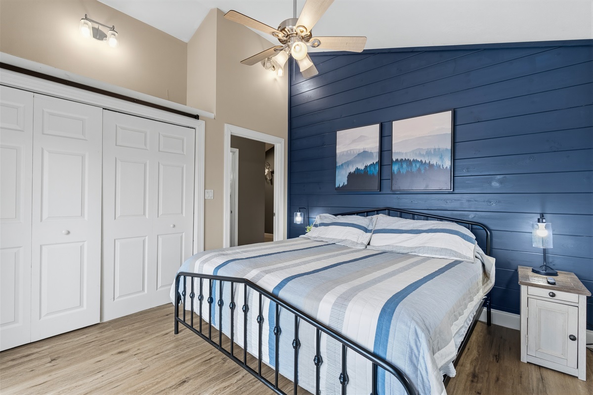 King bedroom waking up to views over the lake