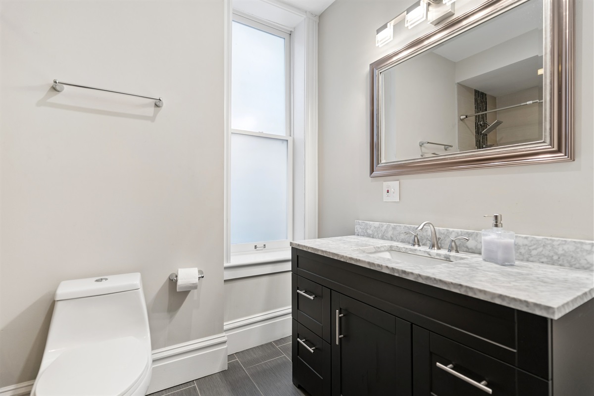 The second-floor full bath is conveniently located just steps from Bedroom #2.