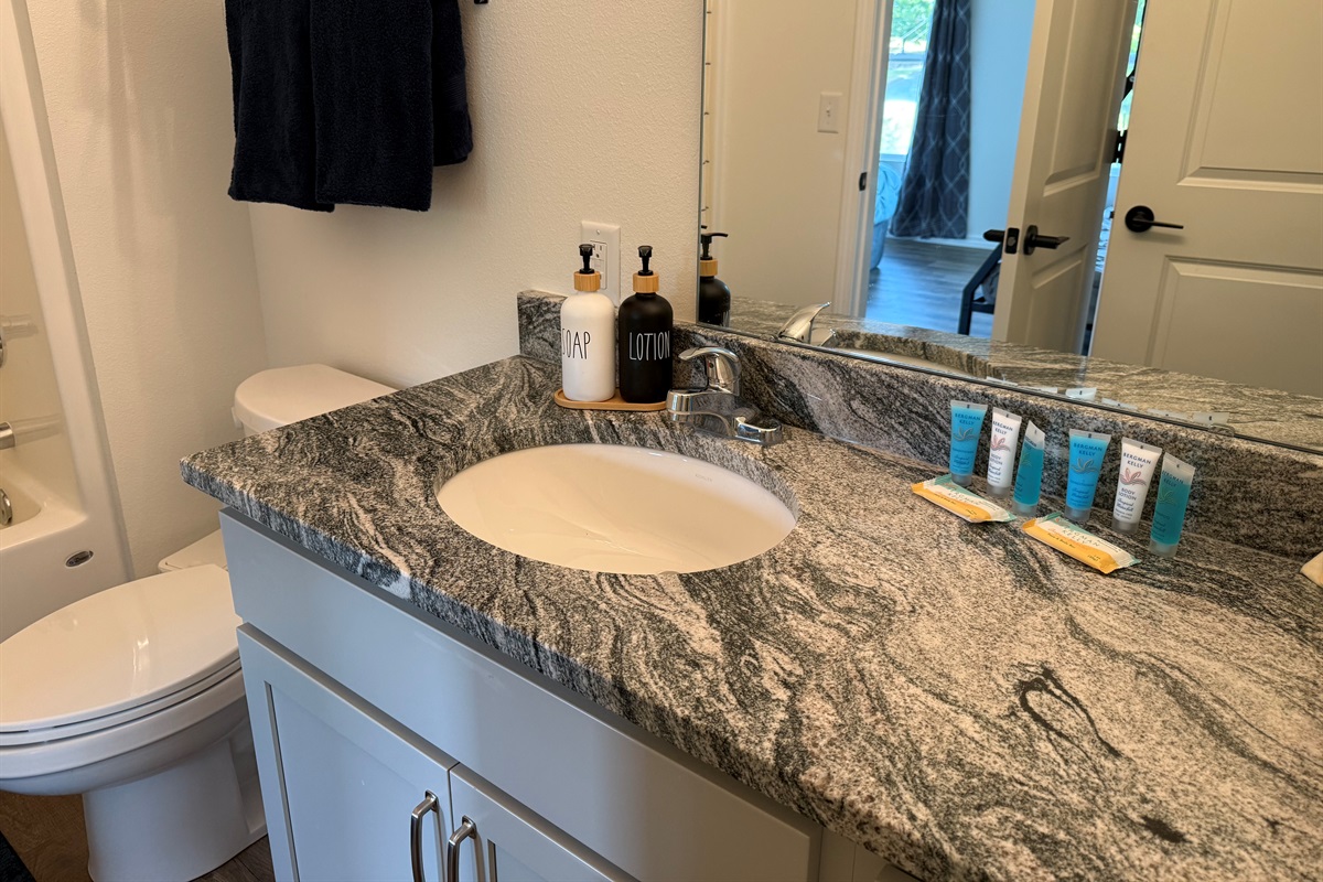 Single bowl with extra counter space in Bathroom #2 for your essentials.