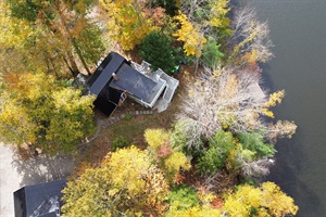 View from above of the lake house, Long Pond and Maine's fall foliage colors
