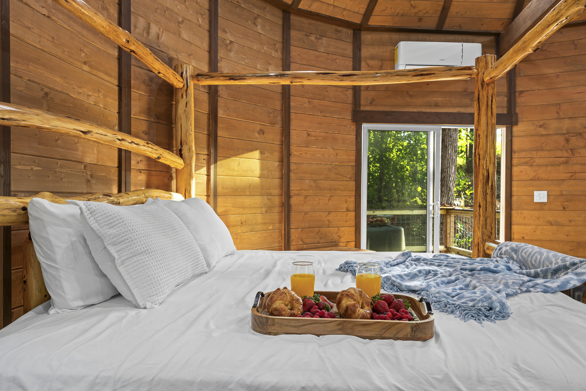 Rustic Retreat: Enjoy a breakfast spread while overlooking nature's beauty from your serene sanctuary!