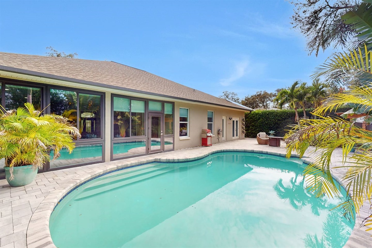 Fresh exterior view leading straight to poolside fun.