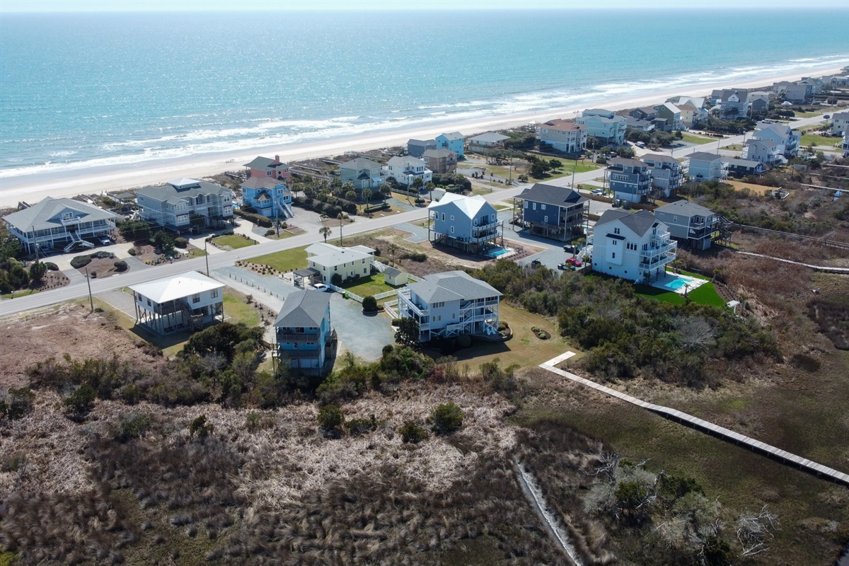 Neighborhood aerial view showing proximity to the beach and ocean