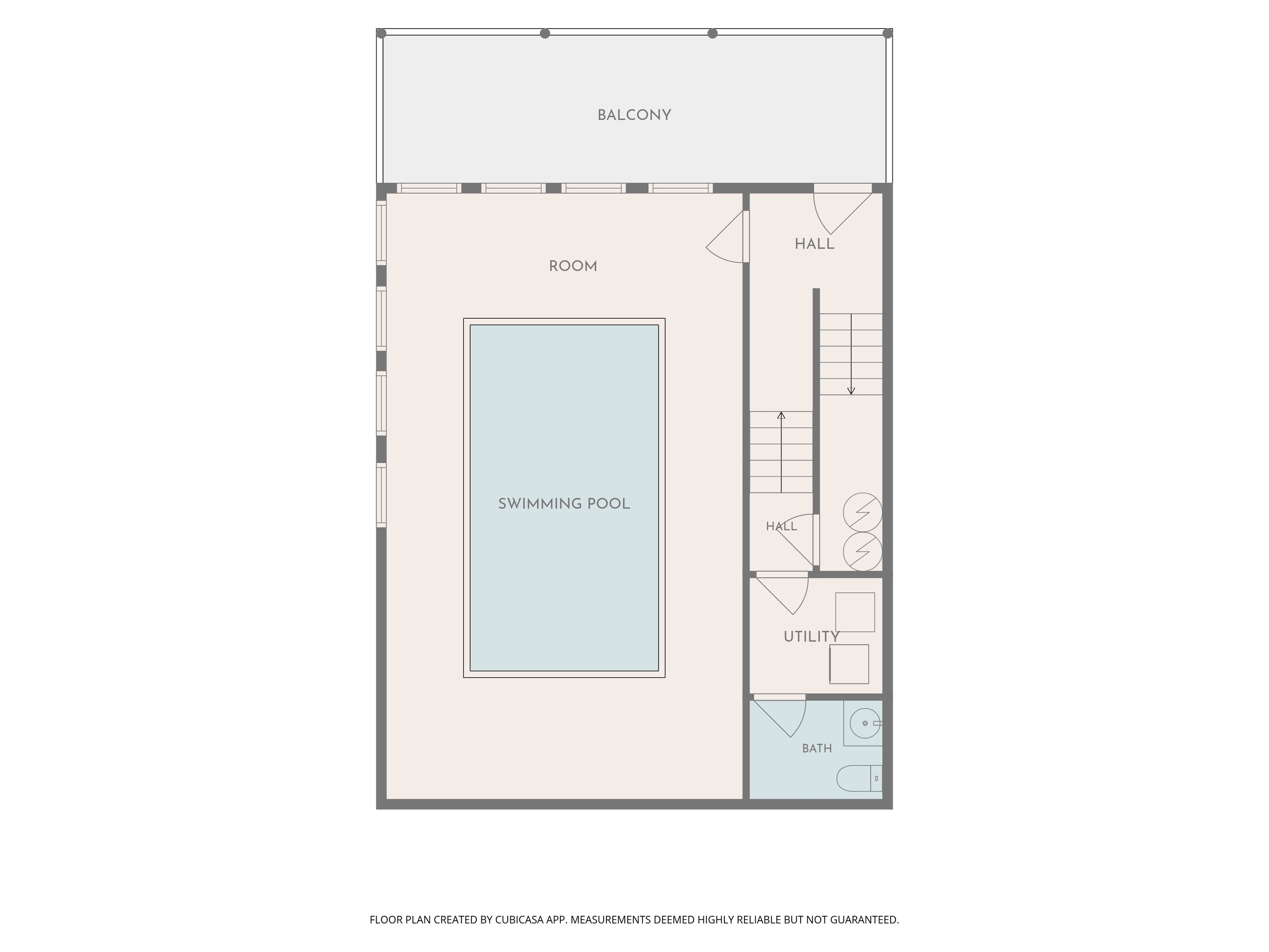 Head back down to the bottom level with the large swimming pool and conveniently located bathroom.