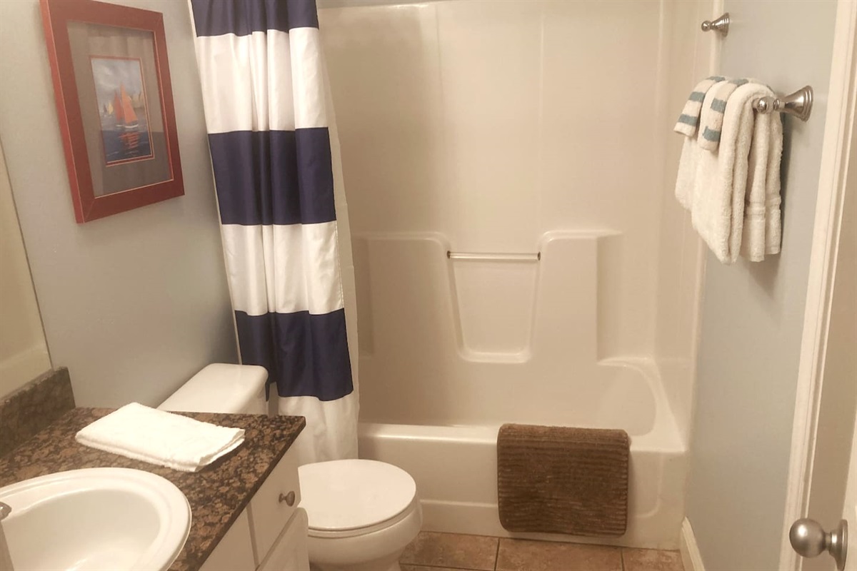 Full second bath convenient to second bedroom and bunkroom. 