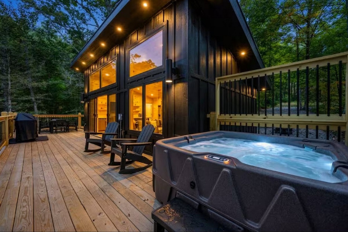 Enjoy the secluded hot tubs on each cabin's deck, surrounded by trees and quiet