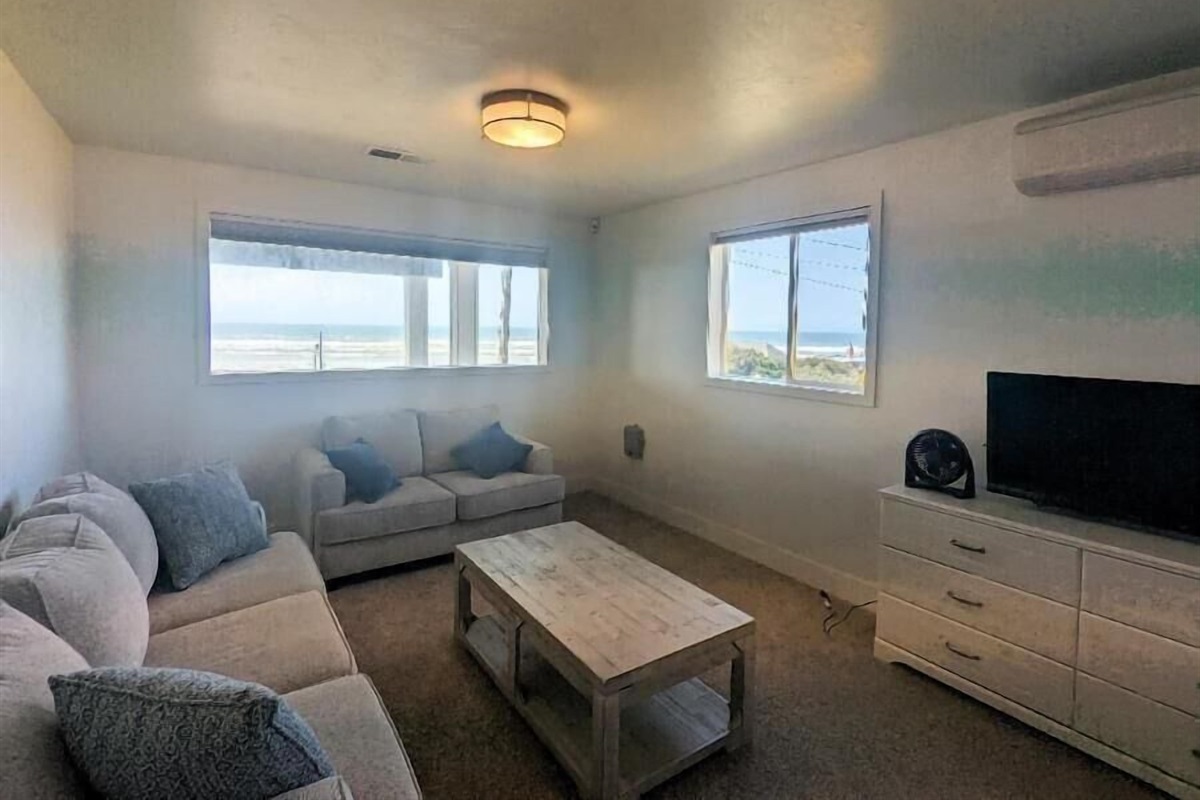 Bunk Room with sofas and TV