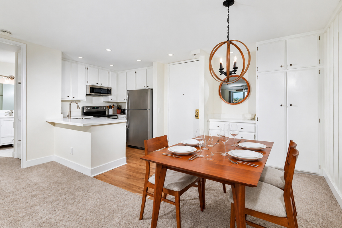 Teak dining set, stainless-steel appliances, and Keurig coffee maker