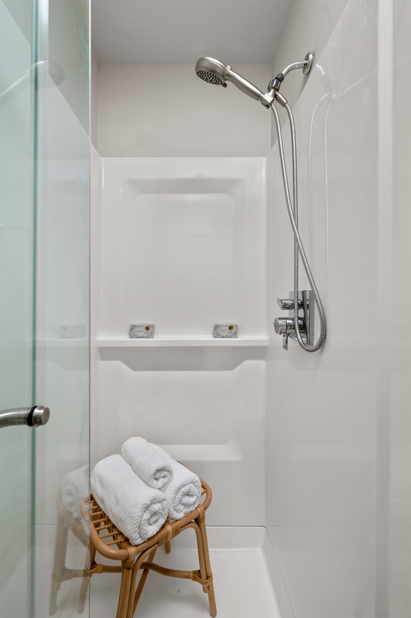 Newly renovated bathroom featuring a modern walk in shower and clean updated finishes for a relaxing and refreshing experience.