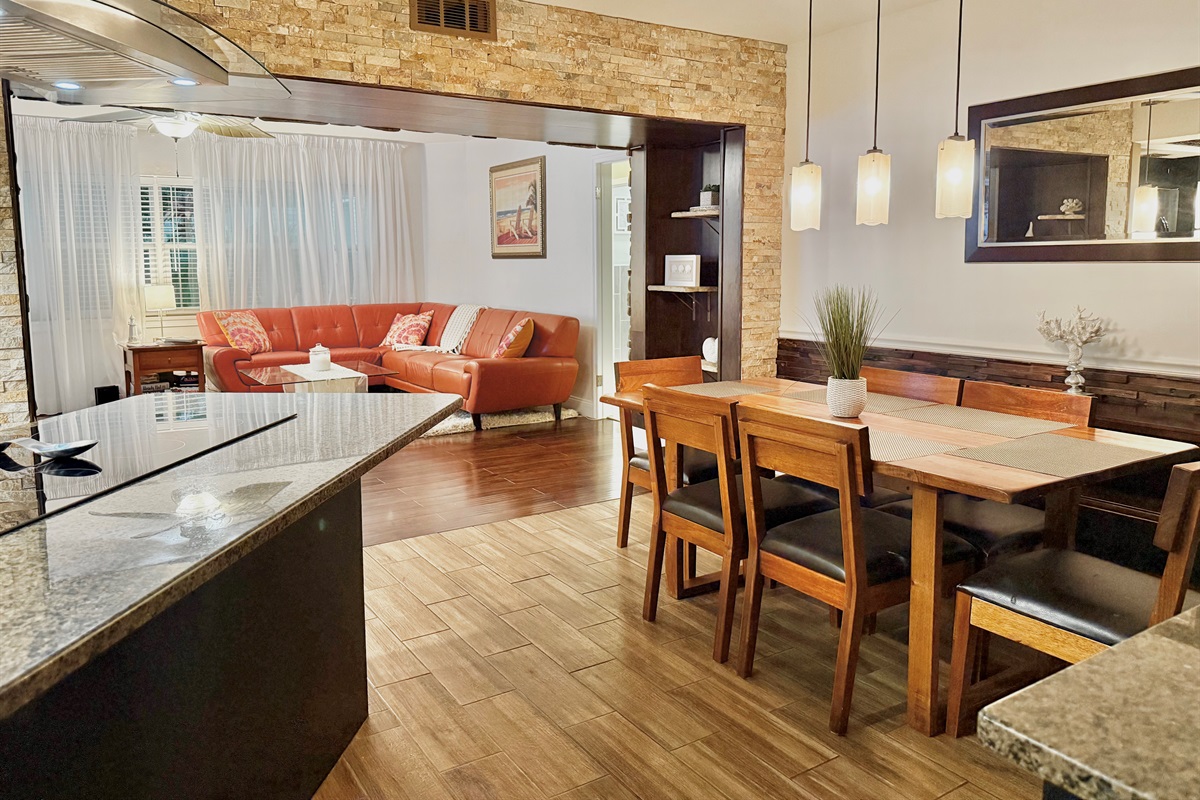 Simple yet refined, this dining space balances clean lines and warm wood elements, offering a relaxed and uncluttered place to dine or work.