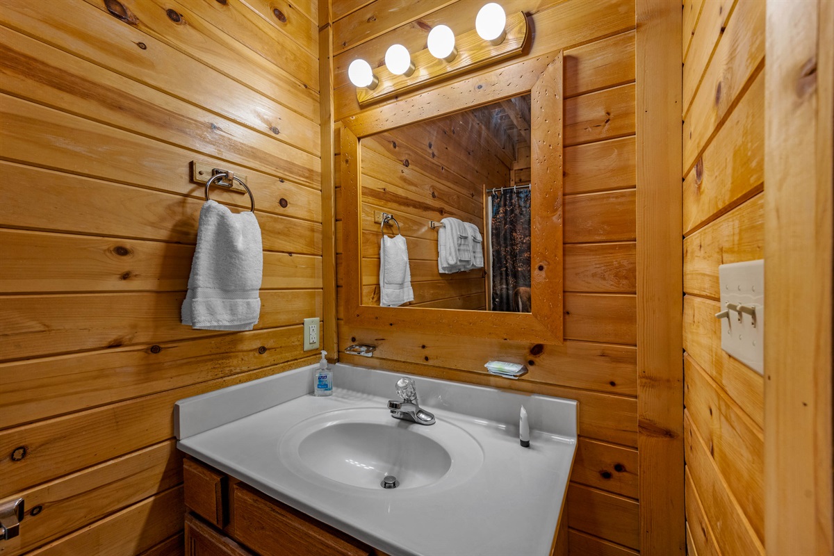 Sparkling clean bathroom with fresh towels and toiletries