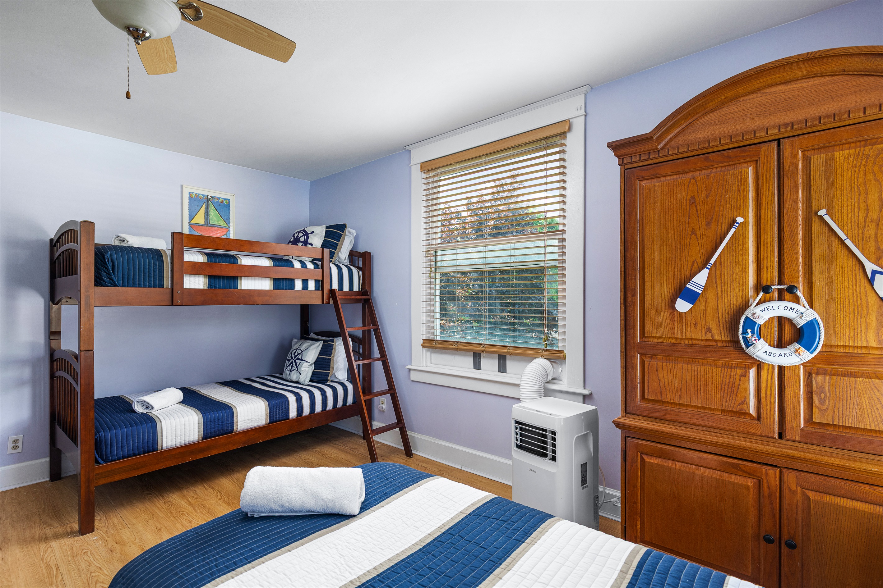 Watch little explorers claim this playful bunk room as their favorite part of the house.