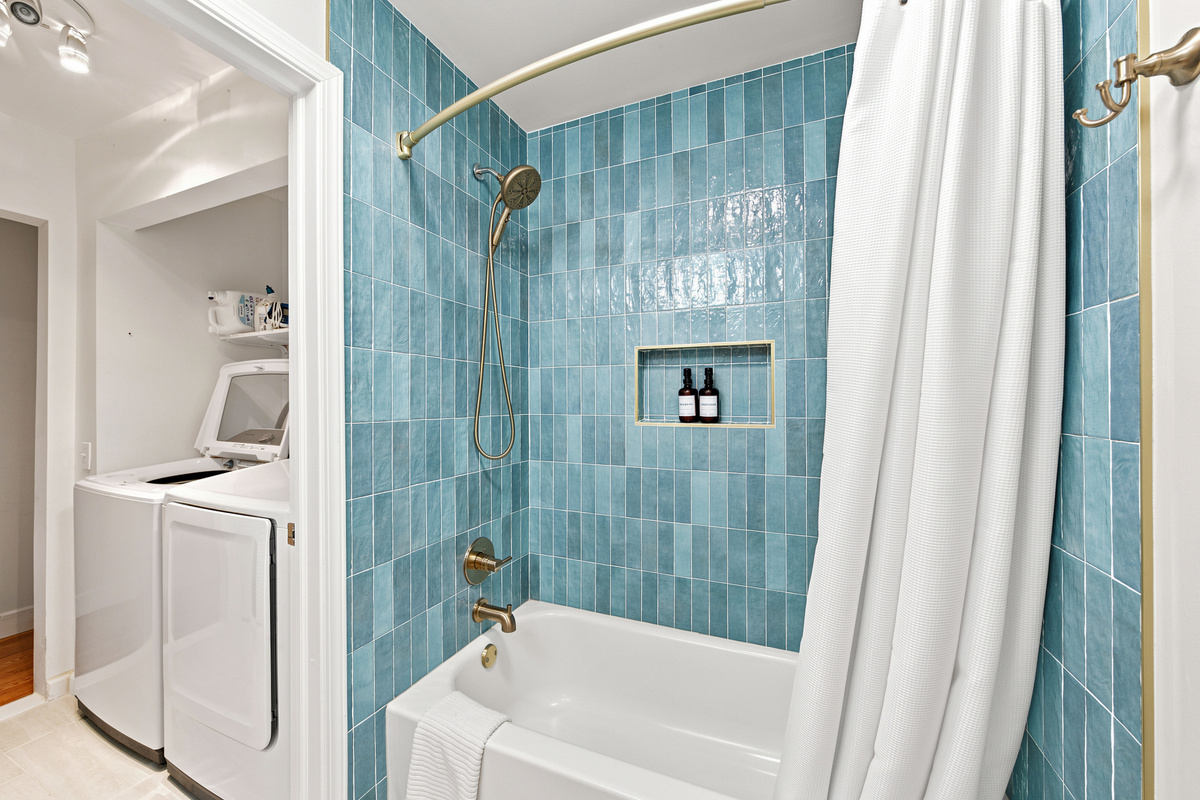 The hall bath has a new bathtub with shower to make taking a shower a joy. Laundry is in the front of the bathroom and is separated by a private door.