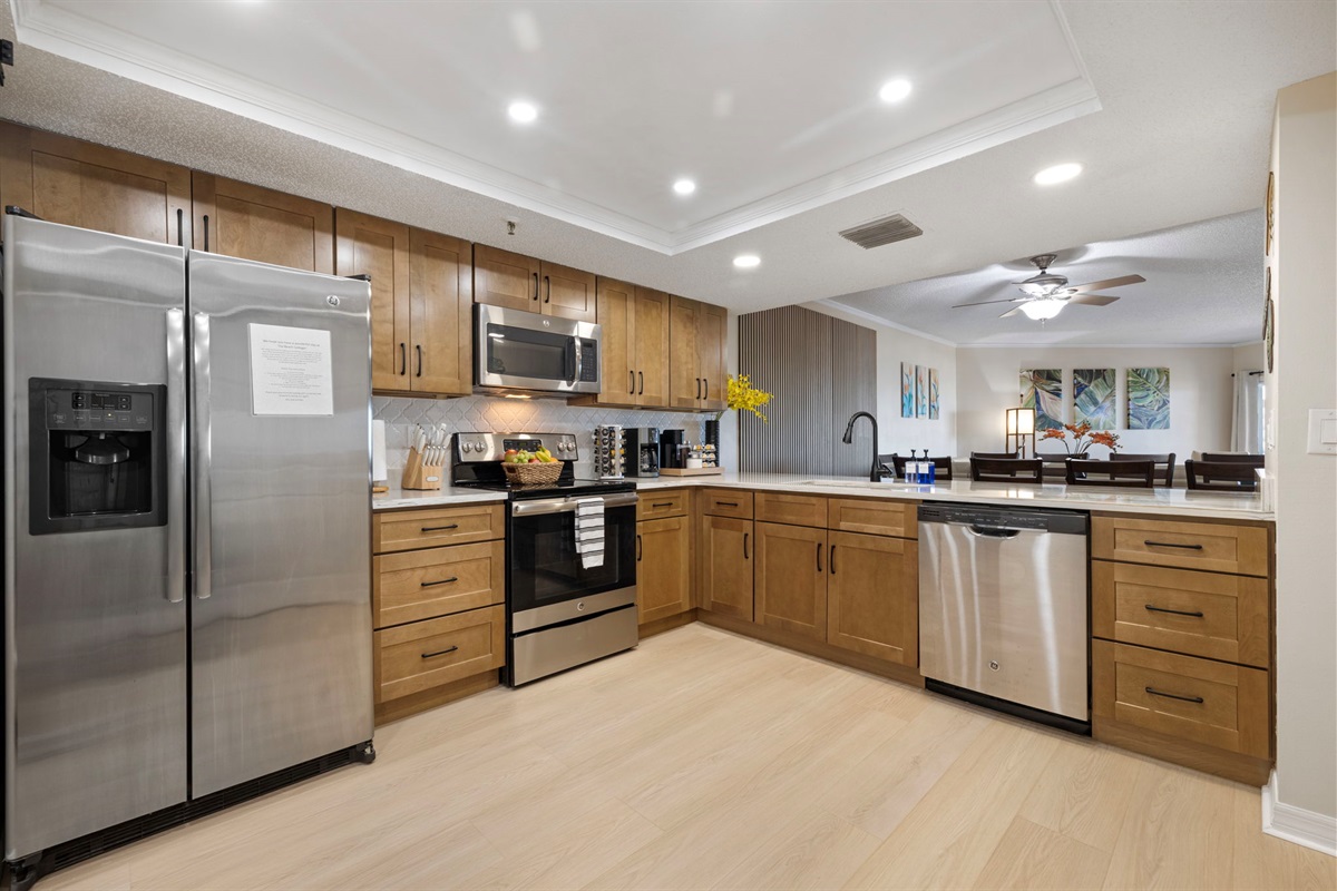 New completely renovated full stocked kitchen with quartz counter tops.