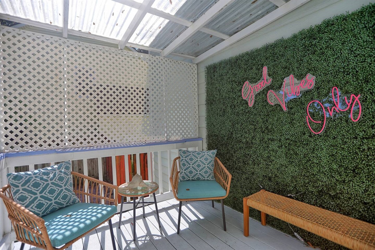Unwind on the rear patio, a cozy spot perfect for enjoying your morning coffee or an evening glass of wine.