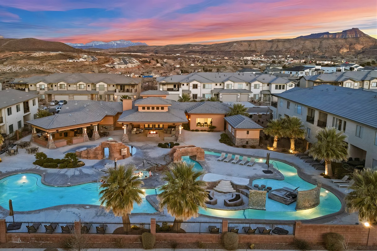 Resort-Style Pool Complex Framed by Desert Peaks