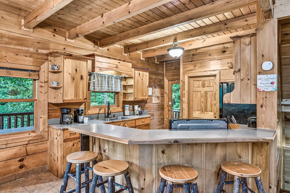 Plenty of counter space and bar seating make meal prep a fun, group activity.