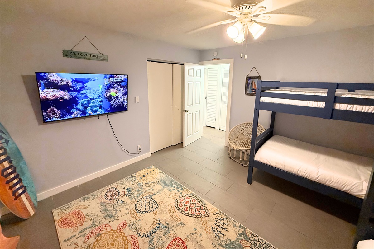 Bunk room is the perfect place for kids to gather - a Smart TV allows them to watch their favorites!