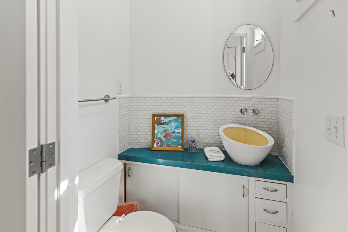 Laundry Hall/Bathroom Leads to Backyard